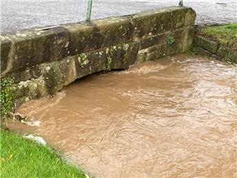 M.P. VISITS TO DISCUSS FLOODING ISSUES