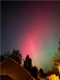 NORTHERN LIGHTS VISIBLE IN VILLAGE